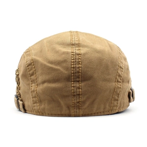 Detail of khaki cotton beret showing stitching and adjustable metal buckle on the back