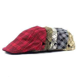 Detailed view of checkered linen flat caps in five colors with metal side buckles