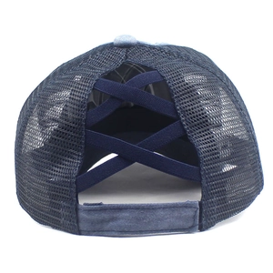 Detail view of navy blue mesh ponytail baseball cap with elastic criss-cross back straps