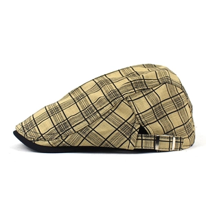 Macro detail of breathable linen plaid beret hat with adjustable metal side buckle