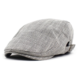 Detailed view of the vintage herringbone pattern and adjustable metal side buckle on hat