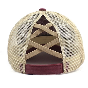 Detail of burgundy ponytail mesh baseball cap with elastic criss-cross back design