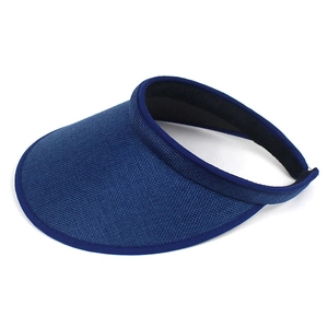 Detail of dark blue sun visor with woven texture and thick black sweatband lining