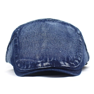 Front view of distressed dark blue washed denim flat cap with vintage retro texture