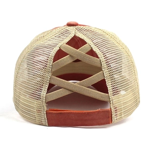Detail of ponytail baseball cap with khaki elastic criss-cross bands and mesh back
