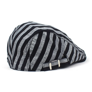 Detail view of cotton linen striped beret cap with adjustable metal side buckle