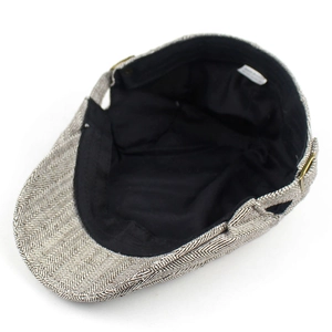 Classic cotton herringbone flat cap with adjustable side buckle and black lining detail