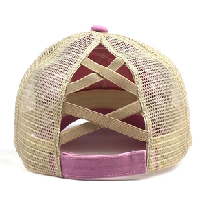 Detail view of pink mesh baseball cap with high ponytail criss cross elastic bands