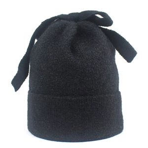 Women's warm black knit beanie with a cute 3D bow decoration for winter fashion