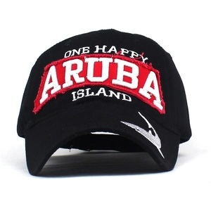 Close-up of ARUBA letter embroidery and fabric patch on black baseball cap