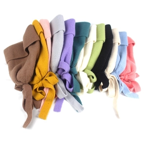 Women's warm winter knitted beanie with bow ribbons available in 12 vibrant colors