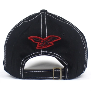 Detail of adjustable metal buckle and eagle embroidery on washed black baseball cap