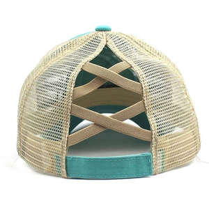 Detail of mint green ponytail baseball cap with mesh back and elastic criss-cross straps