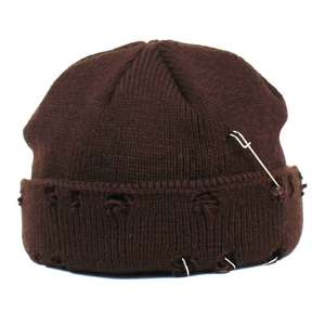 Brown distressed knit beanie with metal rings and safety pin for street style