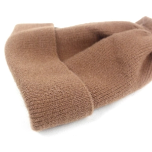 Brown ribbed knit beanie for women with warm folded cuff and soft wool blend texture