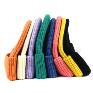 Folded knit beanie hats in eight vibrant colors including orange, purple, and green