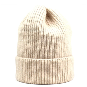 Minimalist knit beanie in creamy white ribbed cashmere style with folded brim for winter