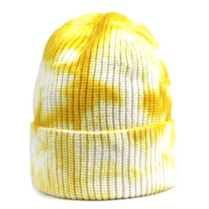 Trendy yellow and white tie-dye knitted beanie hat for women with ribbed texture design