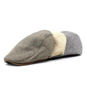 Classic herringbone wool flat caps for men and women in khaki, cream, and dark grey colors
