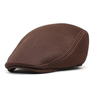 Detail of coffee brown breathable mesh flat cap with fine honeycomb texture