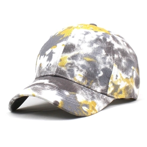 Close-up of yellow and gray tie-dye cotton twill baseball cap with reinforced curved brim