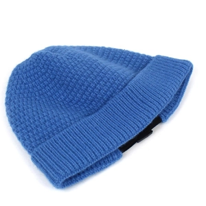 Detail of royal blue waffle knit beanie with ribbed hem and black adjustable strap buckle