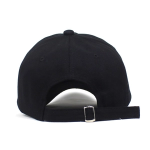 Detail of adjustable cotton baseball cap back with silver metal buckle and strap