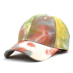Colorful tie-dye baseball cap with vibrant orange and yellow patterns for summer outdoor use
