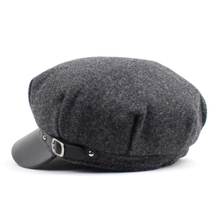 Dark grey newsboy cap made of wool felt with black leather brim and silver buckle detail