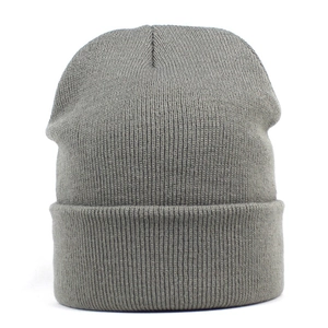 Close-up of a classic grey ribbed knit beanie showing fine texture and foldable cuff