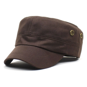 Detailed side view of a dark brown cotton cadet cap with vintage bronze ventilation eyelets