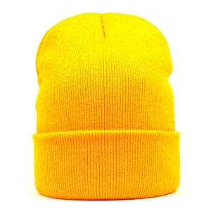 Detailed view of yellow ribbed knit beanie with cuffed brim and warm fabric texture