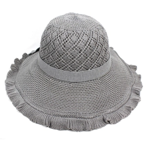 Elegant grey knitted wide-brim sun hat with hollow lace patterns and ruffle edges