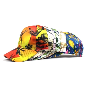 Women's floral baseball caps with tropical palm and botanical prints for sun protection
