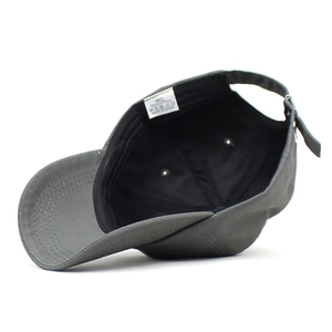 Deep grey cotton baseball cap showing internal sweatband, six-panel structure and adjustability