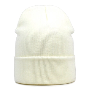 Detail of cream knit beanie featuring thick vertical ribbing and a folded cuff design