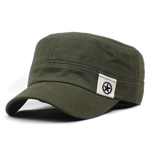 Detail of olive green cotton military cap showing star patch and canvas texture
