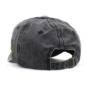 Vintage washed cotton baseball cap in charcoal grey with dark green maple leaf accents