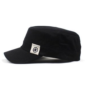 Detail view of cotton cadet cap with star patch and flat top design in black color