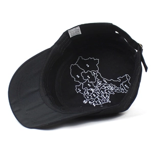 Adjustable cotton military flat top cap in black featuring a map print inner lining