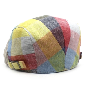 Adjustable unisex plaid newsboy cap with colorful patchwork design on white background