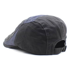 Detail view of the breathable mesh back and adjustable buckle on this summer flat cap