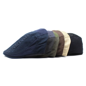 Detail view of mesh ivy caps in six colors showing breathable fabric and side embossed letters