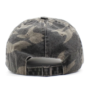 Detail of the camouflage baseball cap back with an adjustable metal buckle and strap
