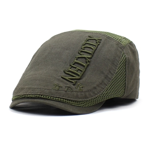 Detailed macro view of army green mesh beret cap with NEXT 3D embroidery detail