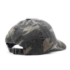 Detail view of the vintage camo baseball cap featuring a metal adjustable buckle