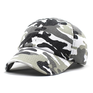 Macro detail of camouflage printed cotton twill fabric on a curved brim baseball cap