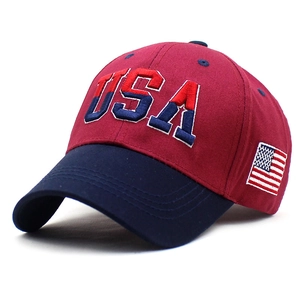 Detail of USA 3D embroidery and American flag patch on red and blue baseball cap