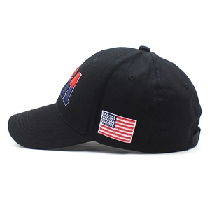 Detailed side view of black cotton baseball cap with USA and flag embroidery