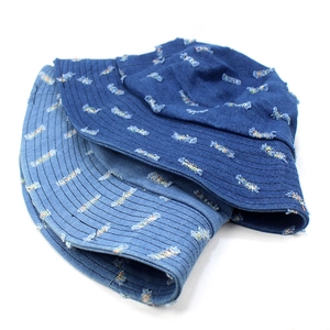 Distressed denim bucket hats in dark and light blue with unique frayed hole details